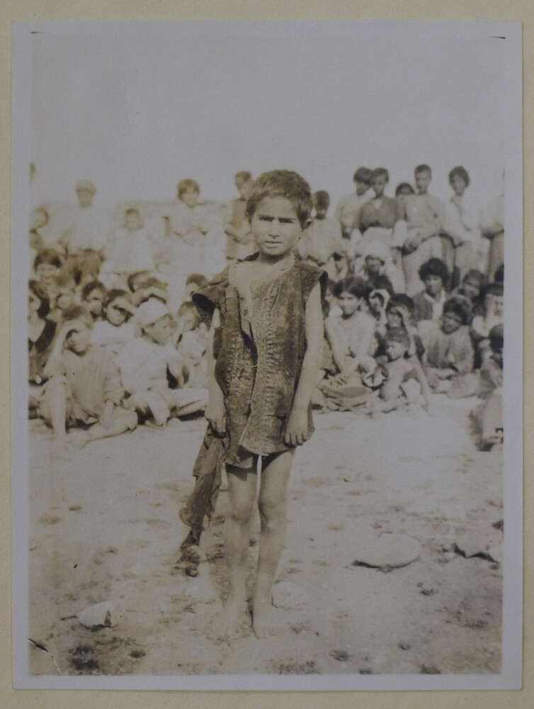 Sirvert Tatoanian waits to enter Orphanage No. 7. Erivan, c. 1920.