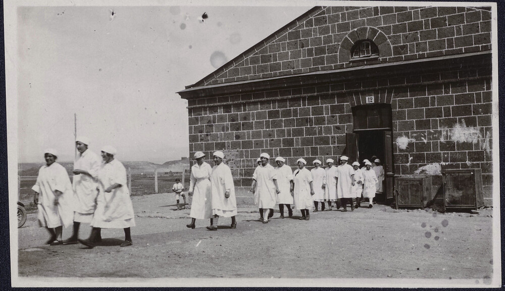 Nursing students leaving clinic building. Alexandropol, c. 1924