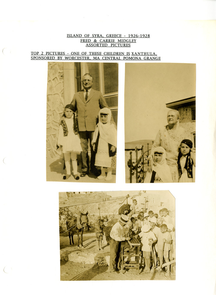Orphans in folk costume with Fred and Carrie Midgley, including Xanthula