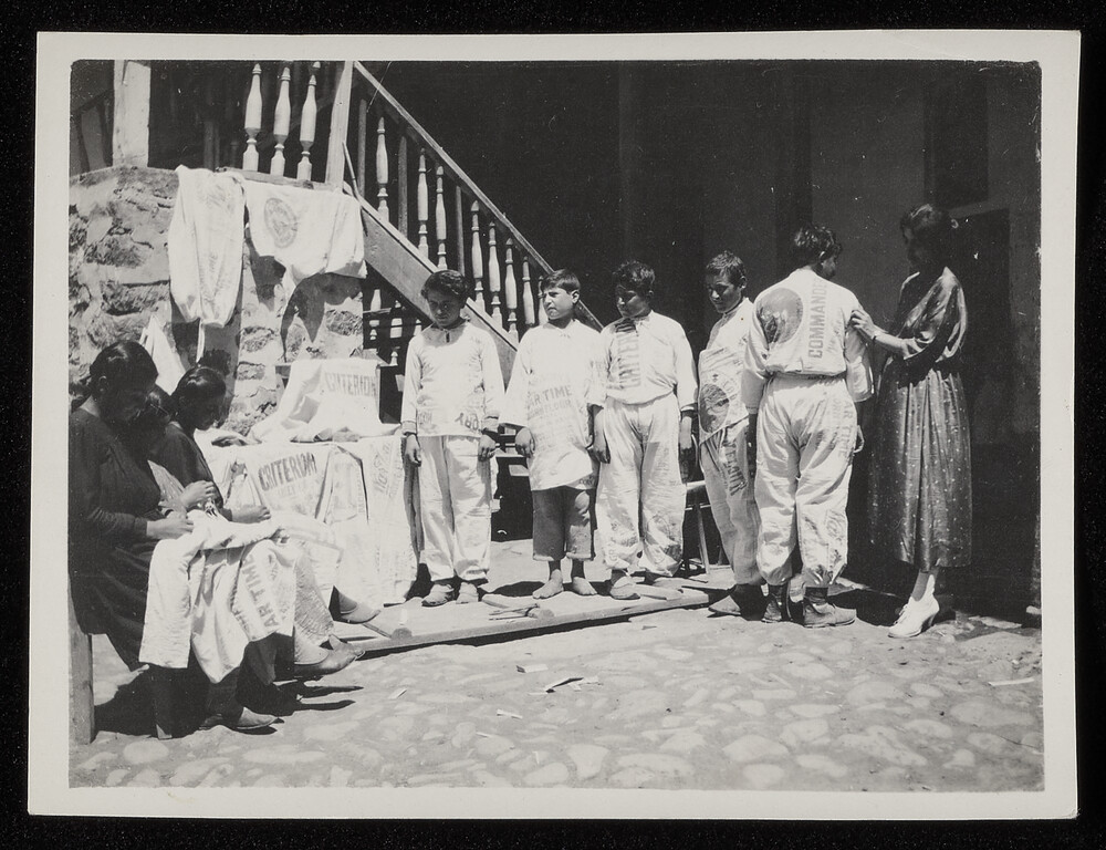 Boys in suits sewn from American flour sacks, Caucasus, 1920s