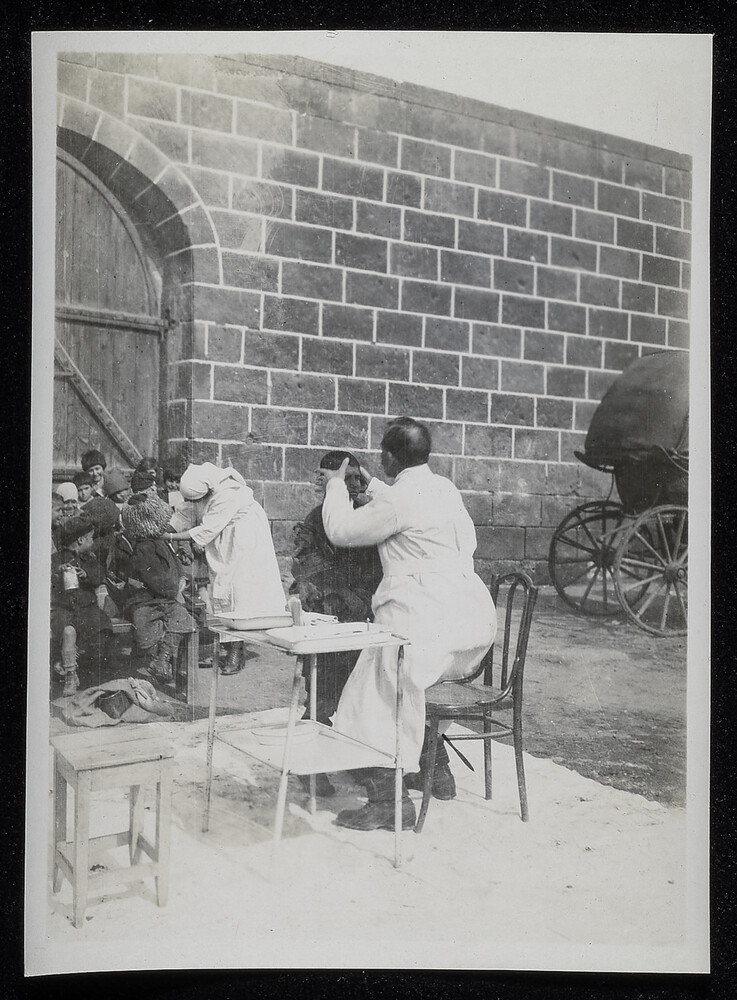 Outdoor clinic at the orphanage wall, Caucasus, 1920s