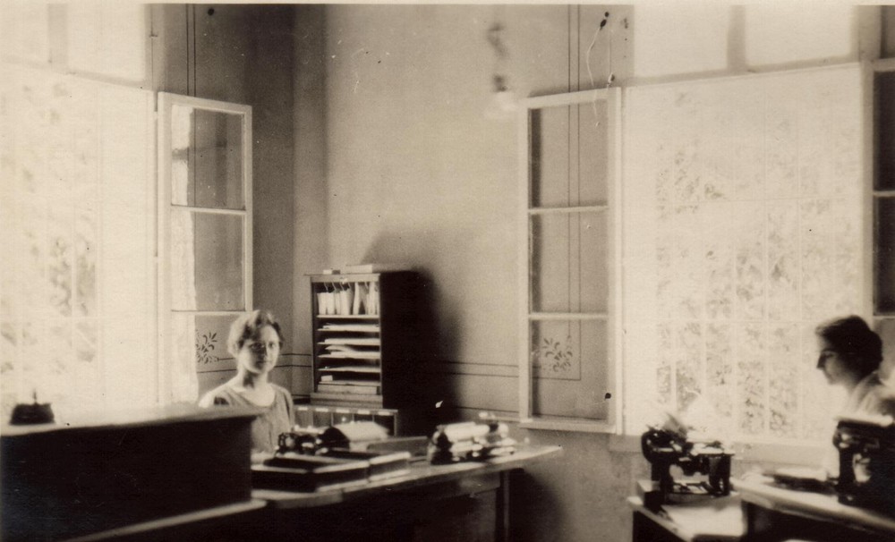 Nellie Miller (left) in the Near East Relief regional office in Beirut, where she served as secretary to the treasurer, c. 1922.