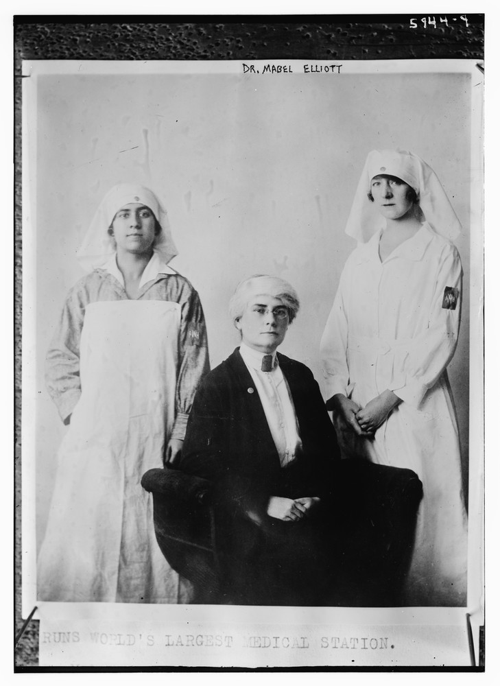 Dr. Mabel Elliott (seated) with two American Women's Hospitals nurses bearing the AWH insignia, Alexandropol, c. 1919–1922. Library of Congress.
