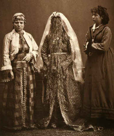 An Armenian bride, center, wearing traditional wedding clothing Constantinople, c. 1873