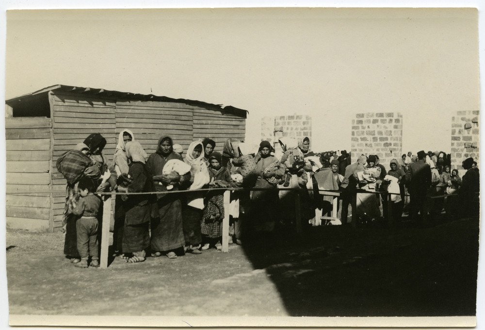 Women and children line up toward a relief shed, Beirut, c. 1921–1923, many 