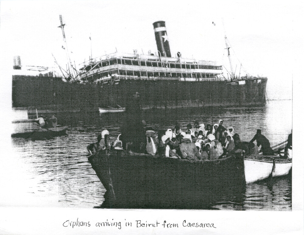 A launch crowded with women and children pulls from a moored steamer in Beirut harbor — 