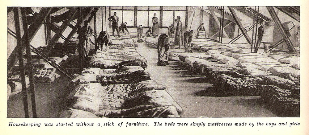 Children making up mattresses in a dormitory at the Erivan (Yerevan) orphanage, Armenia. The New Near East, June 1922. 