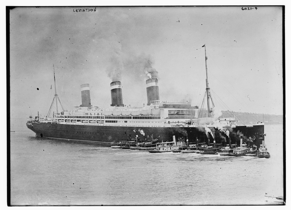 The USS Leviathan with tugboat escort, c. 1918–1919. Library of Congress.