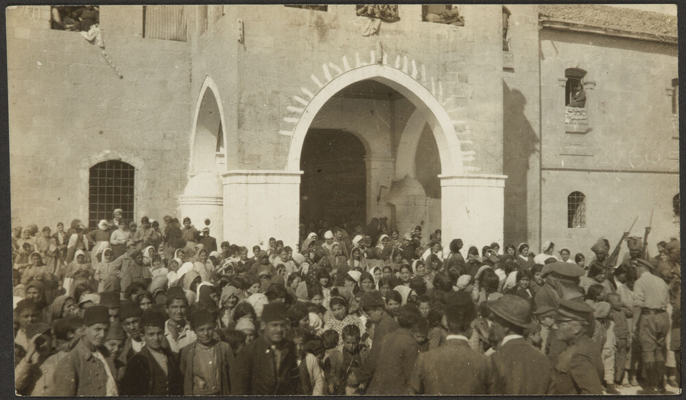 Armenian refugees at the Ottoman barracks gate, Aleppo