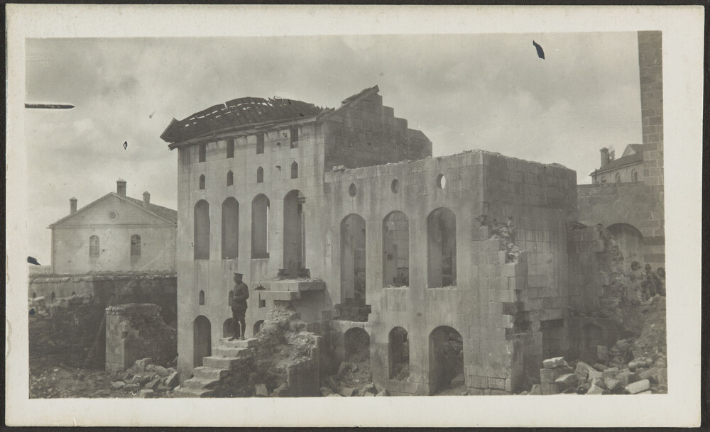 Dr. Wirt in the destroyed Armenian quarter, Aintab