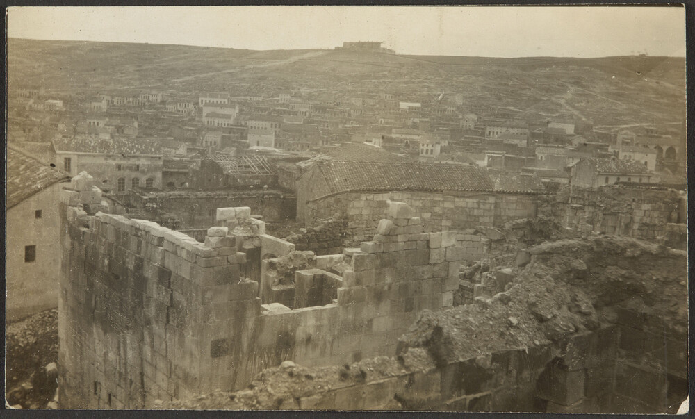 Destroyed Armenian quarter with American College in distance, Aintab