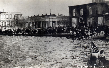 Refugees on the Smyrna quay with an American naval launch in the foreground, September 1922.