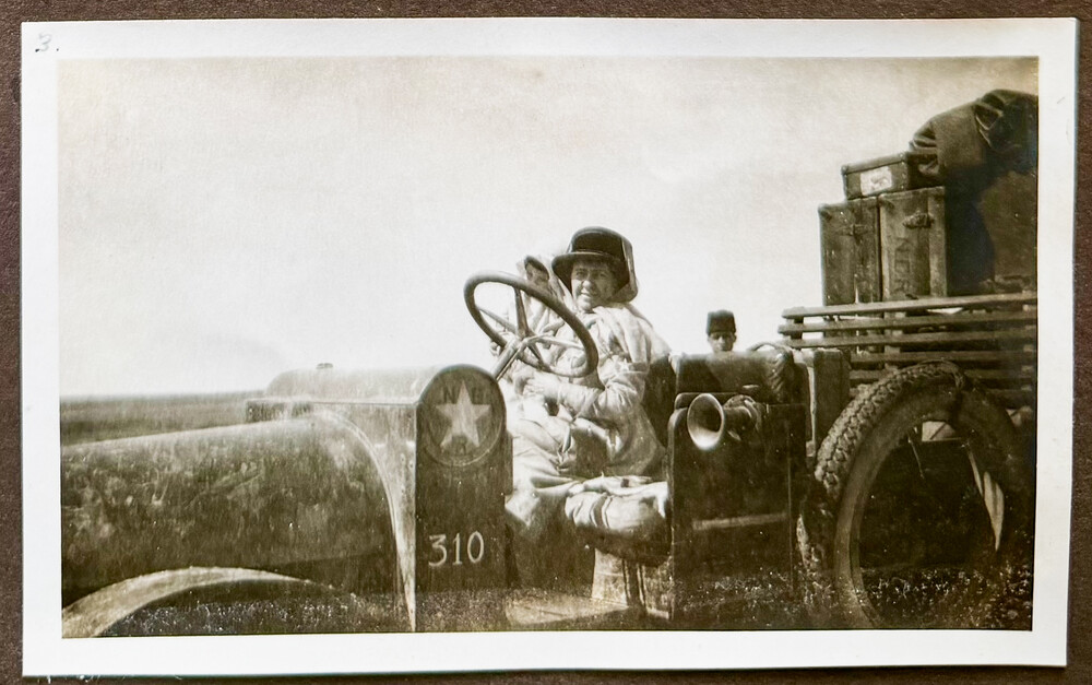 Mrs. Gannaway with Zadi on her lap in NER vehicle 310, spring 1922. From the Bayard Dodge photo album, courtesy of the Dodge family.