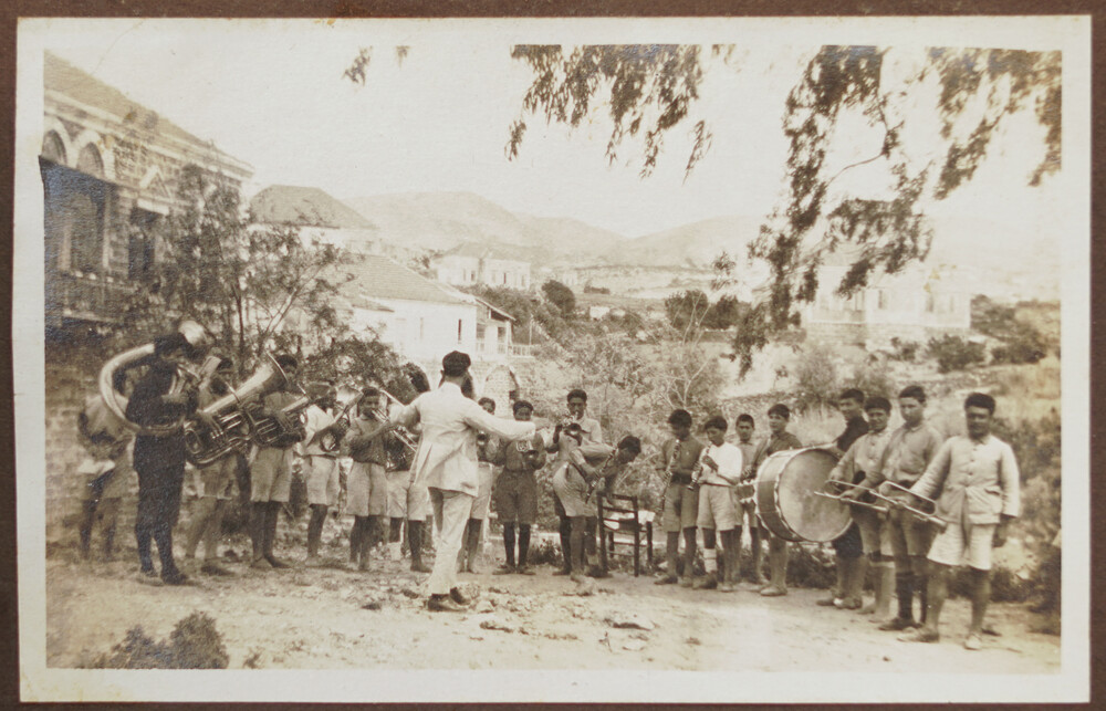 Orphanage boys' brass band and conductor, Jebail, 1922