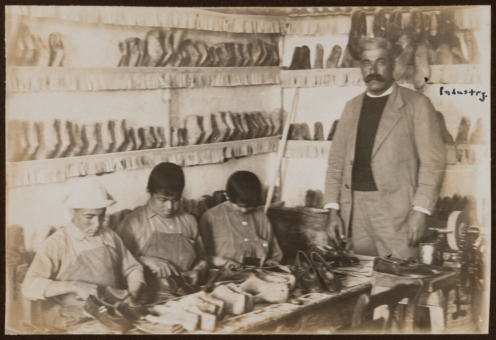 Boys learn shoemaking in the industrial shop. Miamia, 1922.