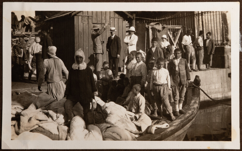 Harpout boys load their belongings to continue their evacuation to Constantinople by sea. Beirut, September 1922.